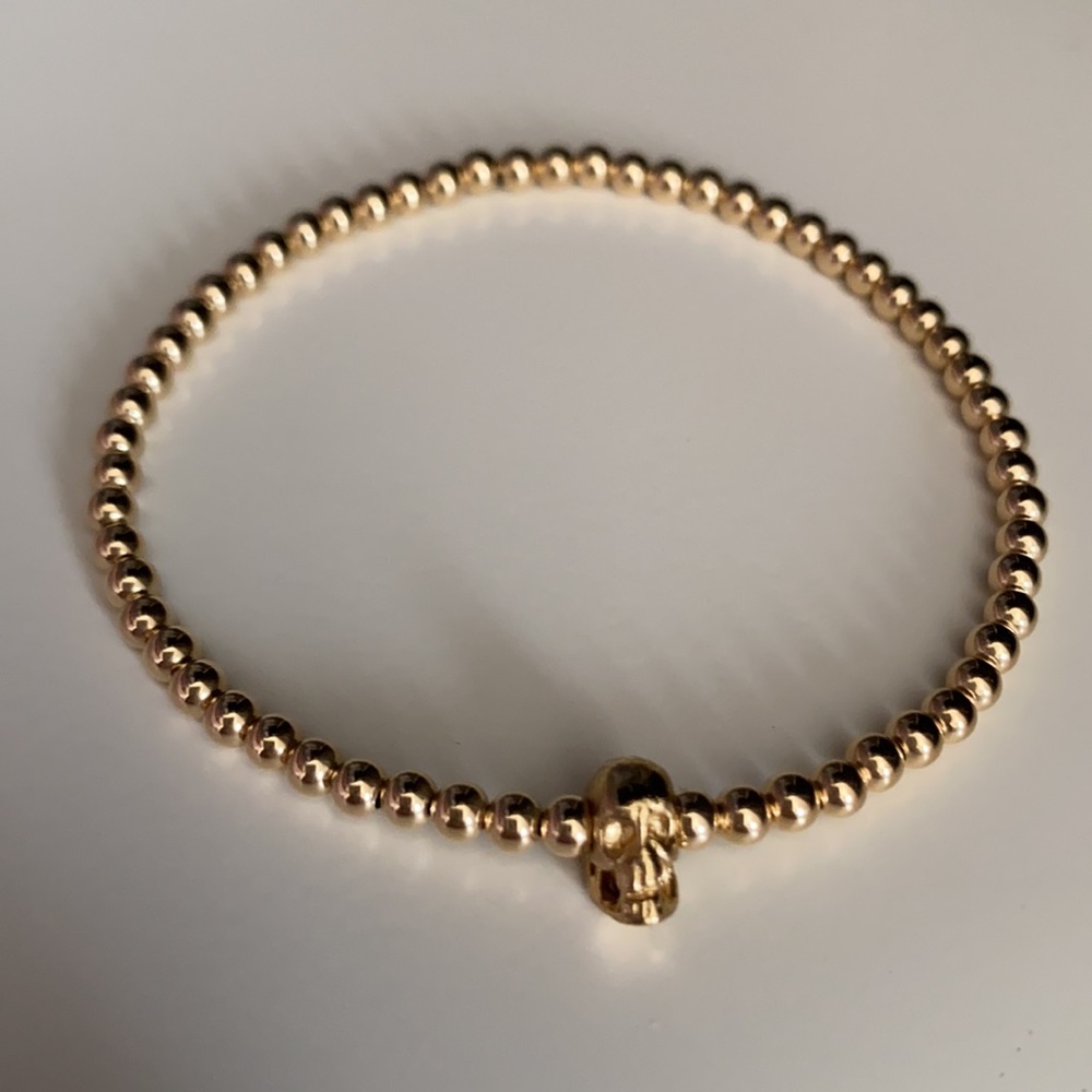 Skull with 3mm Gold beads bracelet